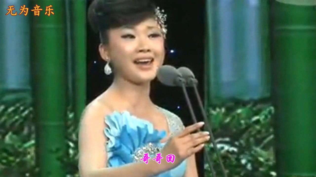 歌手李君演唱的《吊脚楼上等哥回》妹妹等哥心焦急哥哥不知何时归