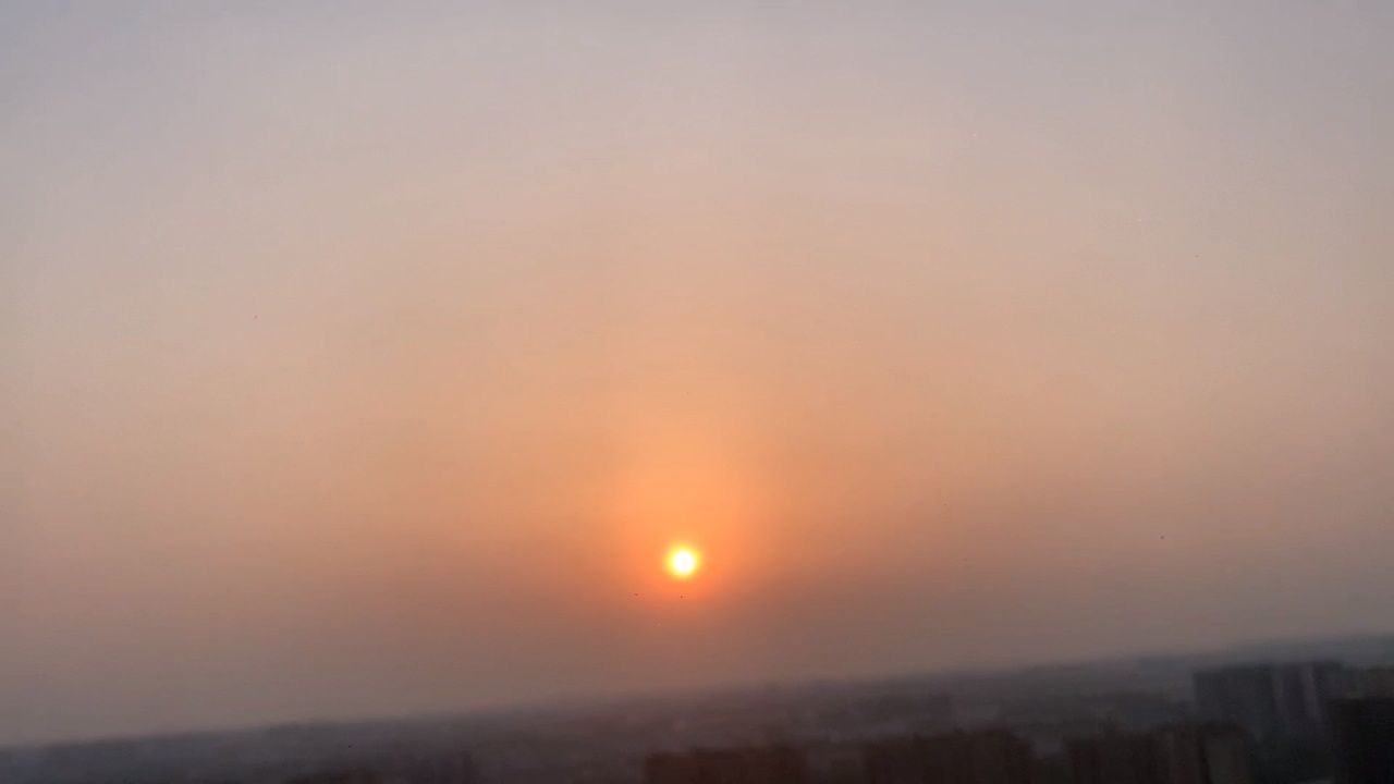 陷入温柔暮色里!远眺成都高新区的落日.