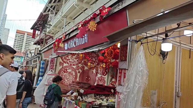 中国妹小店“胡姬花”绽放南洋