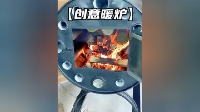 废弃油桶改装取暖炉,不烧油不耗电全家人取暖仅需几根木材