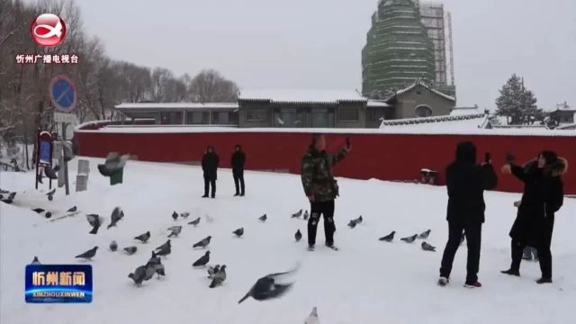 我市各地迎战风雪保畅通 浴“雪”奋战护民生