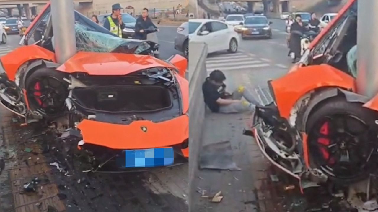 兰博基尼撞上路灯杆,整辆车扭曲变形,驾驶员受伤坐路边