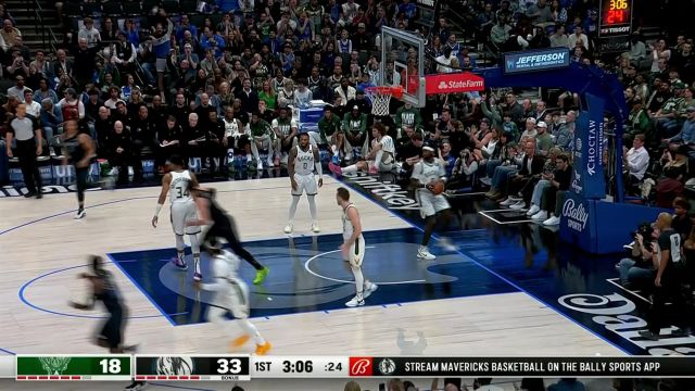 一招一式对他来讲还是很轻松的 东契奇转身跳投应声入网