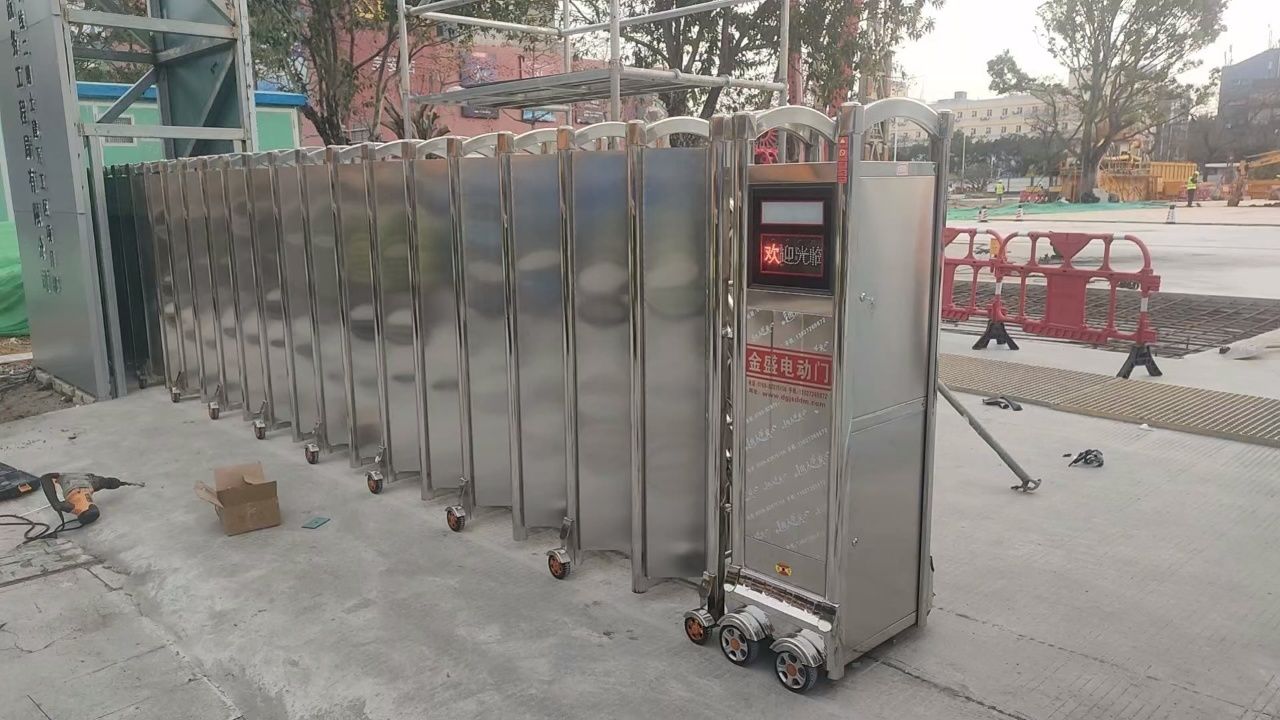工厂工地不锈钢电动伸缩门厂家价格定制安装金盛电动门