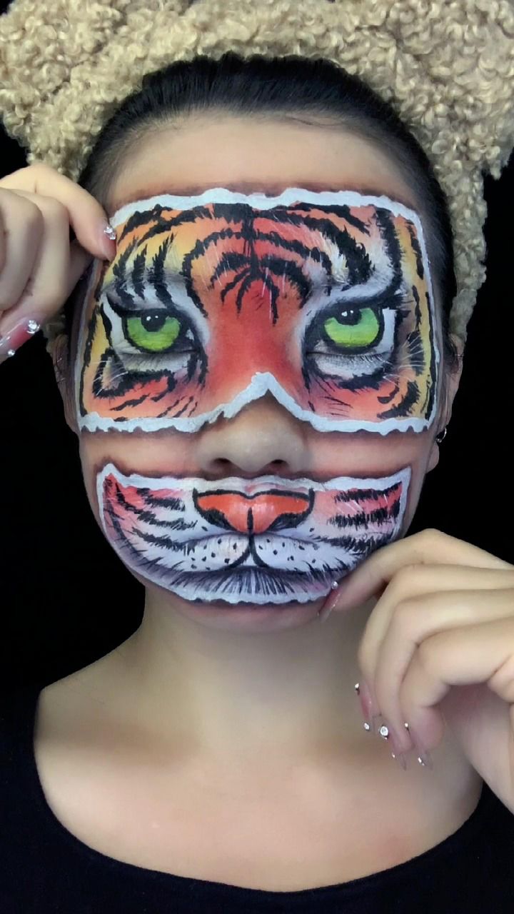 手绘老虎 咱就是说 这妆画的我美颜都没了 最后那只小手 它还挑衅我